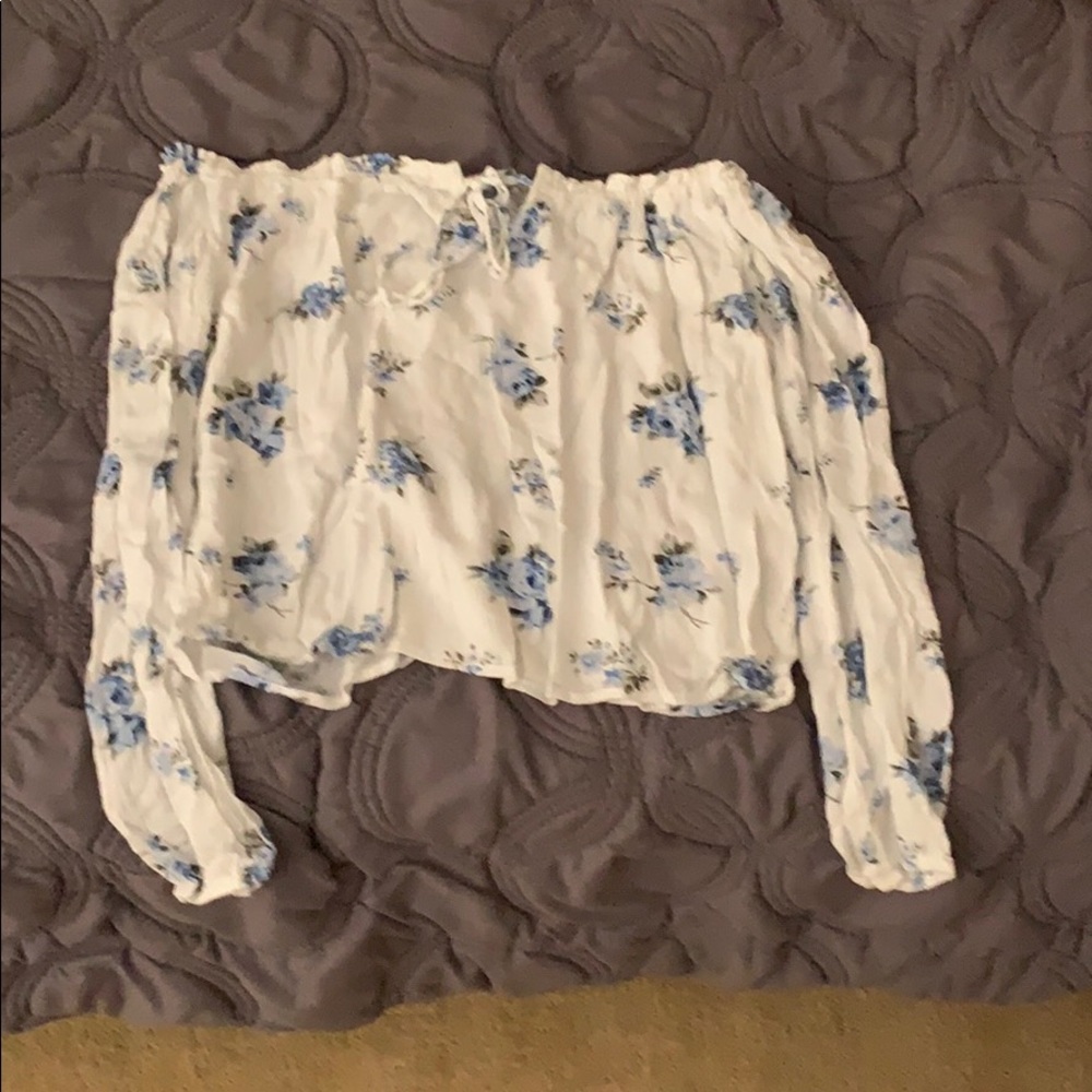Off the shoulders white floral shirt